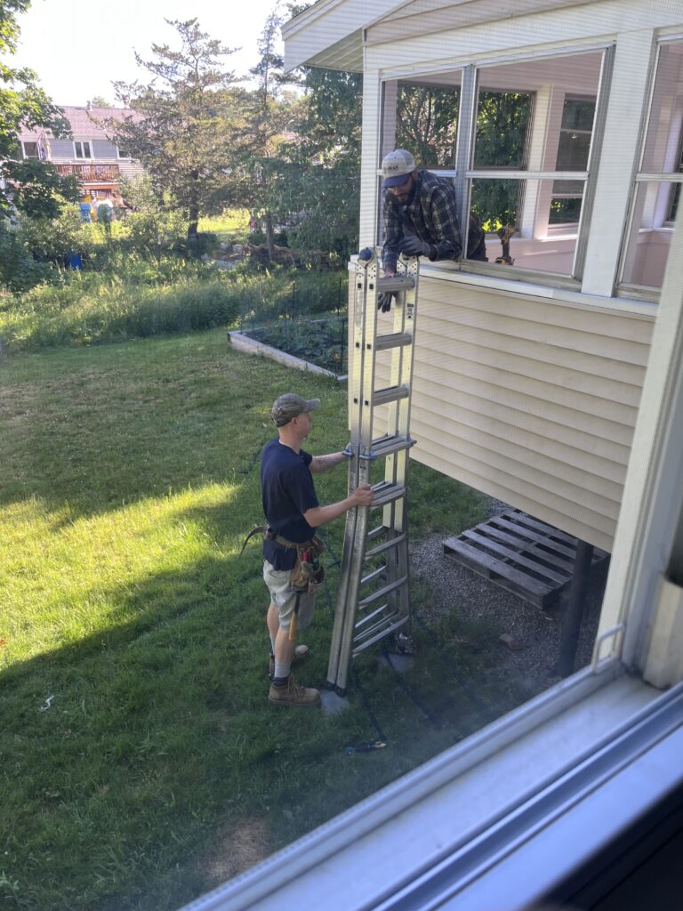 crew on a ladder